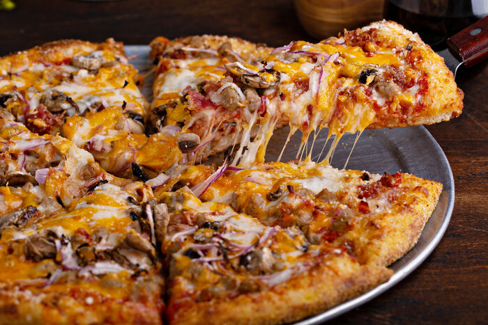 BBQ veggie pizza with mushrooms and hot sauce